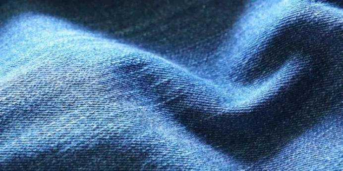 A close up of a piece of denim